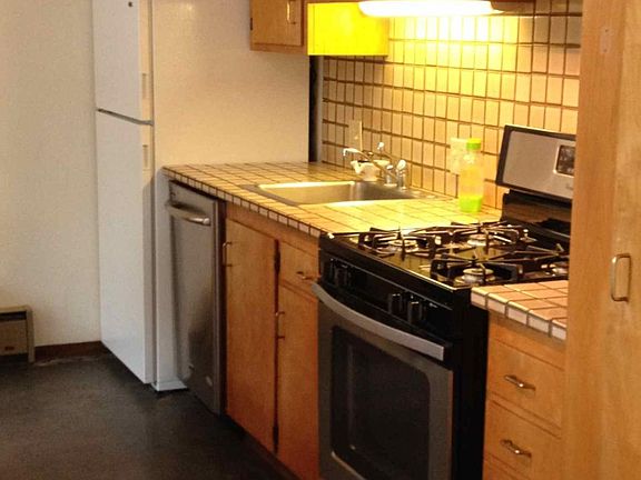 Kitchen is fully-equipped with full-size refrigerator, stove/oven dishwasher.