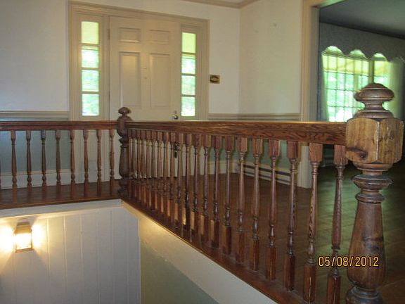 Wide foyer greets you with hardwood floors
