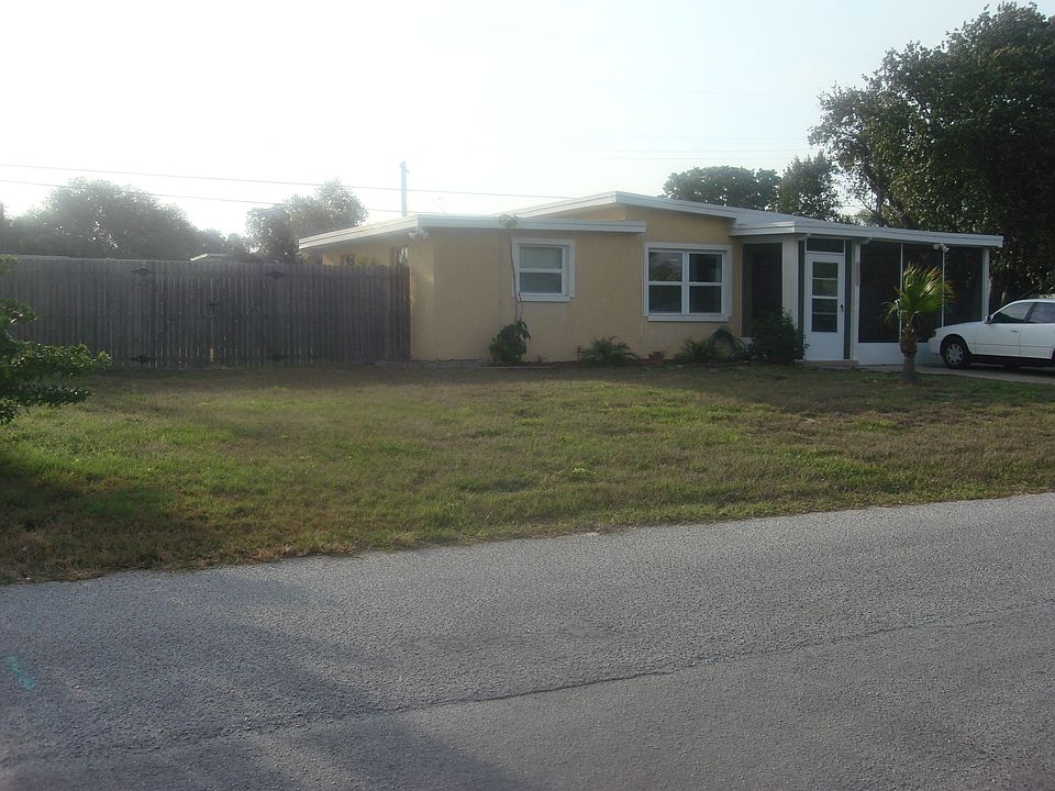 Yellow Home with Large Yard