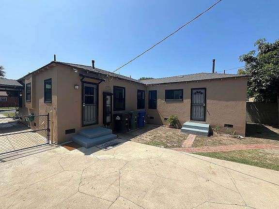 Back of the house. If you separate with a studio the entrance is the door on the right.