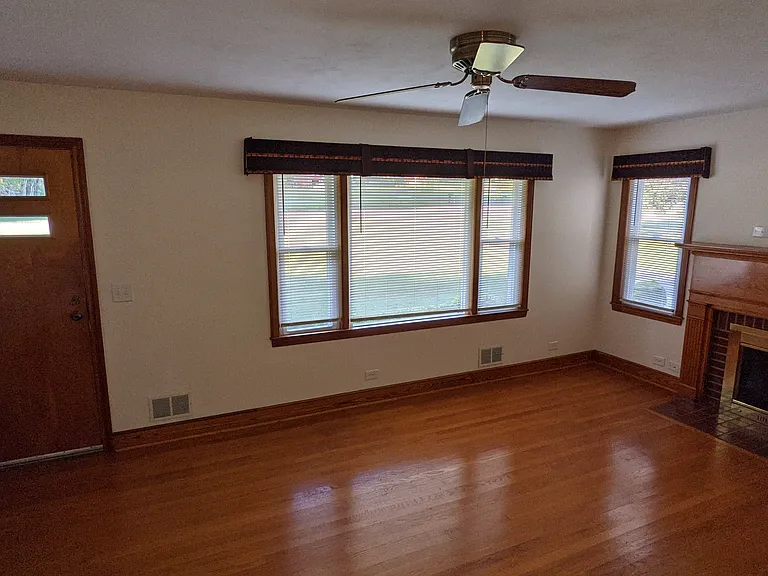 Living room from door and window view.