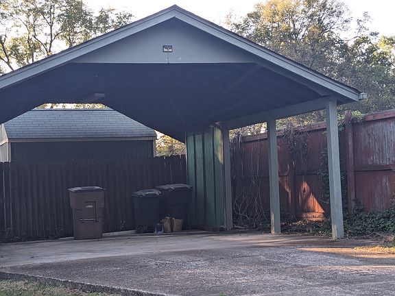 Covered parking plus storage building.