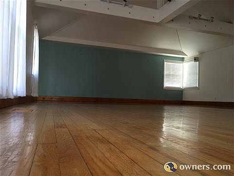 vaulted ceiling / hardwood floors