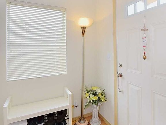 Open entry way has coat closet and lots of room.