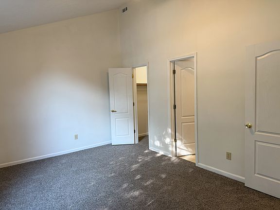 Master suite with high ceilings