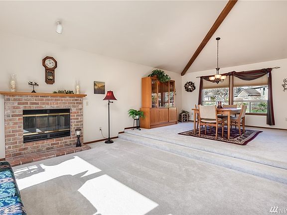 Wood-burning fireplace is also plumbed for gas
