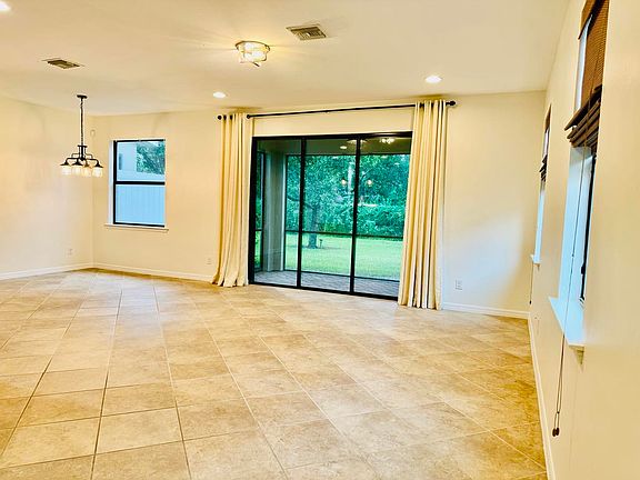 Open living and dining areas.