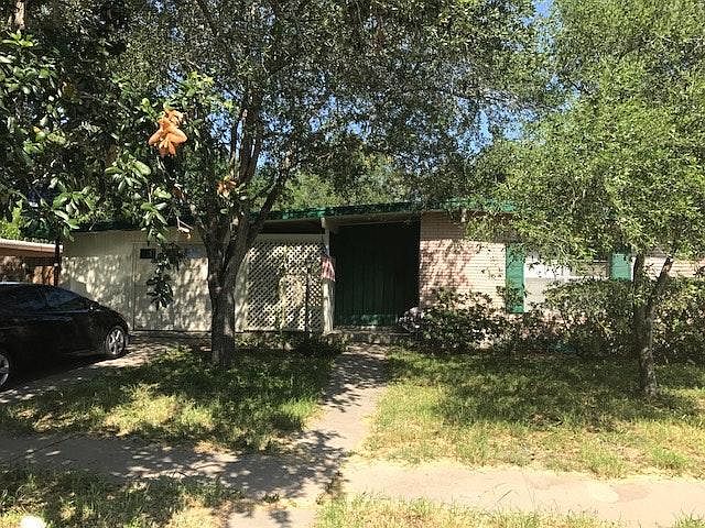 Front yard (garage opens to covered patio and backyard)
