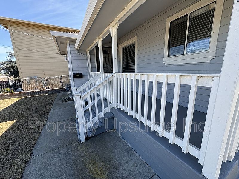 1st image of 104 E 6th St