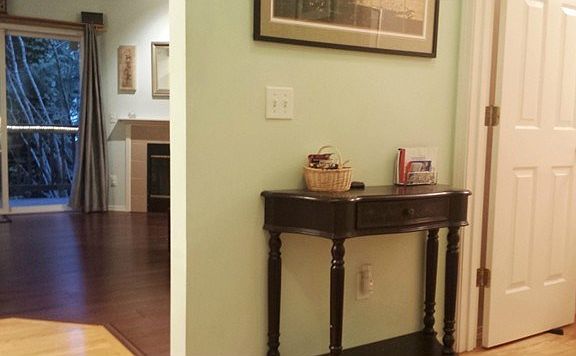 The spacious entry with hardwood floors give you & your guests a