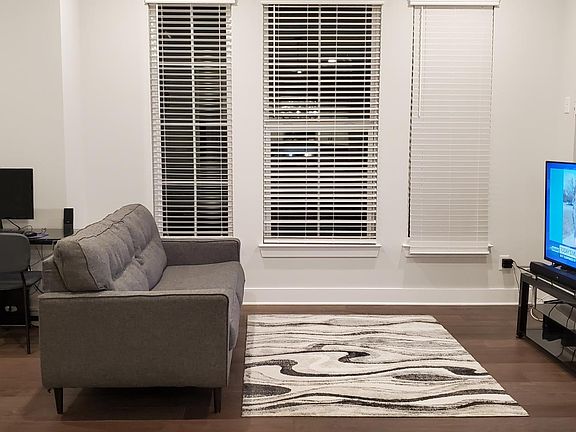 family room, with office desk