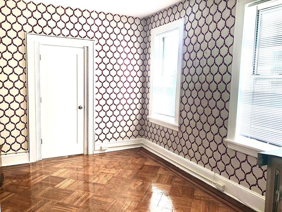 Living Room with Refinished Wood Floors and New Blinds
