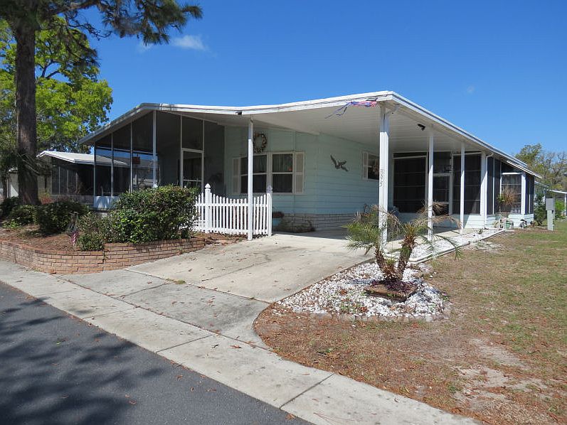 Right front with carport