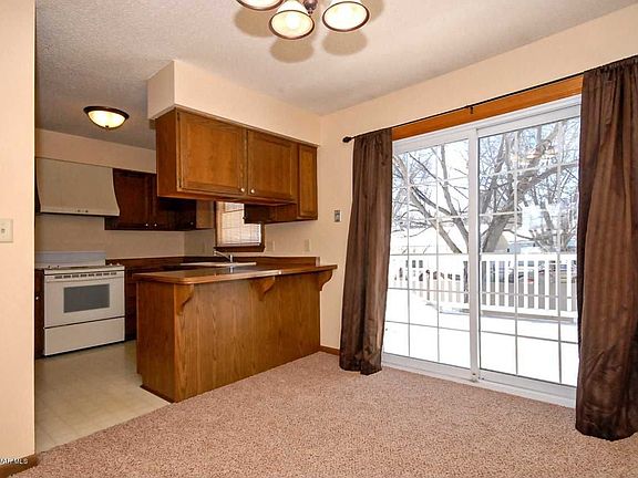 dining with patio door to deck