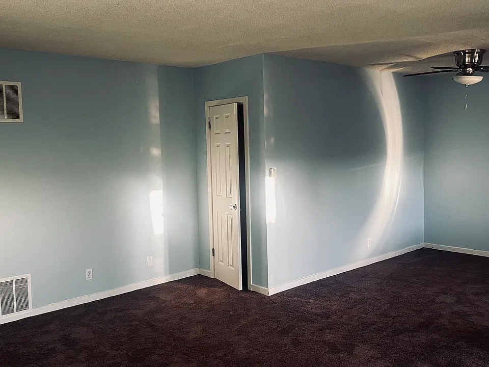 Living room with dinette & ceiling fan
