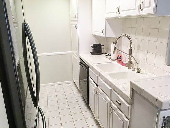 Kitchen with new faucet