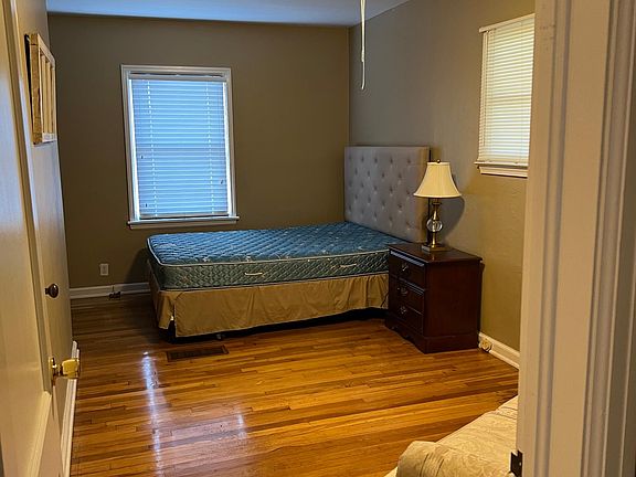 bedroom with closet and dresser