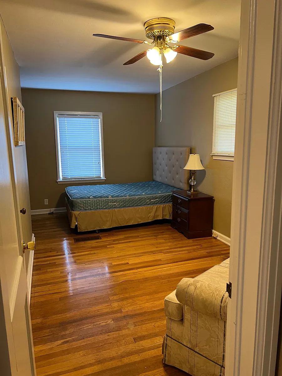 bedroom with closet and dresser - 225 N Park Dr