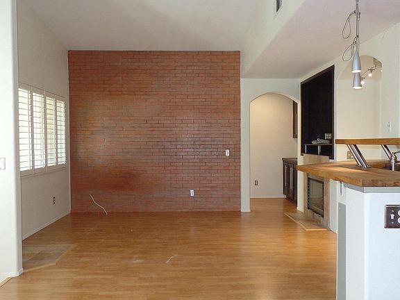 Living room and hallway leading to the second bedroom.