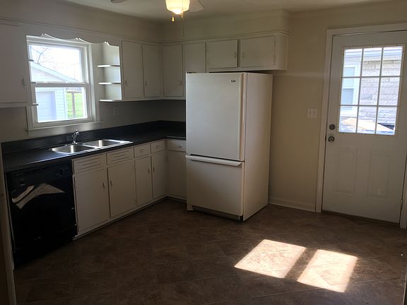 Kitchen with new side entry door and all appliances