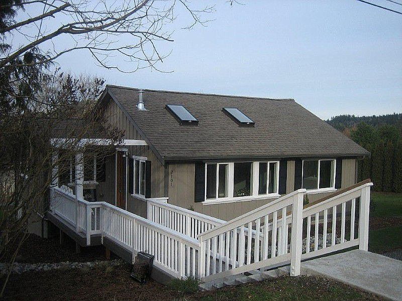 Walkway to the front door with arbor