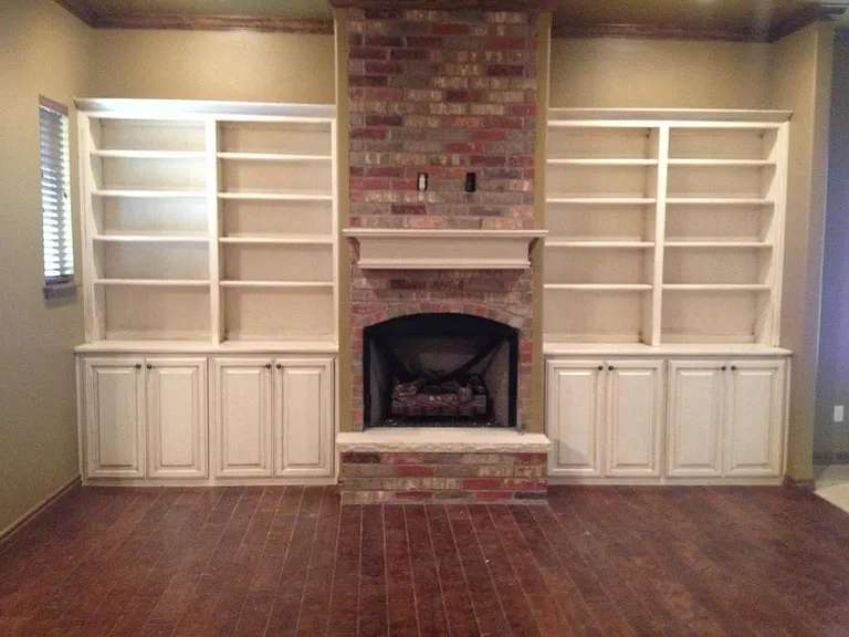 Fireplace with built in cabinetry. Hook ups for your tv is above the fireplace.