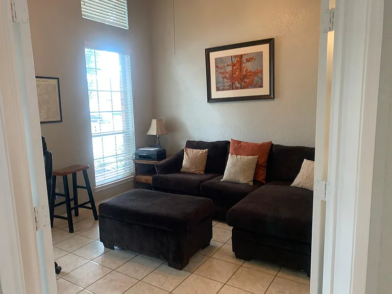 Additional furniture in the office allows for this space to be used as an additional living area.