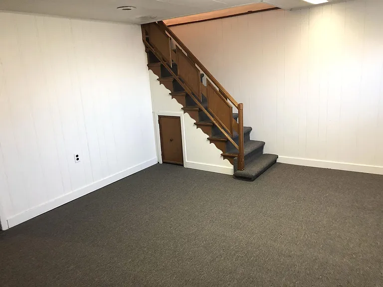 Finished basement with brand new carpet