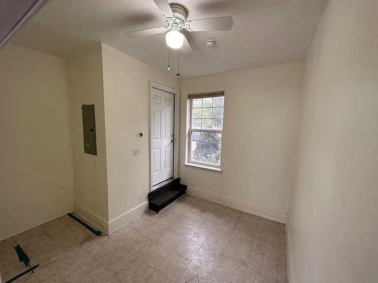 Mud room between garage and front door foyer
