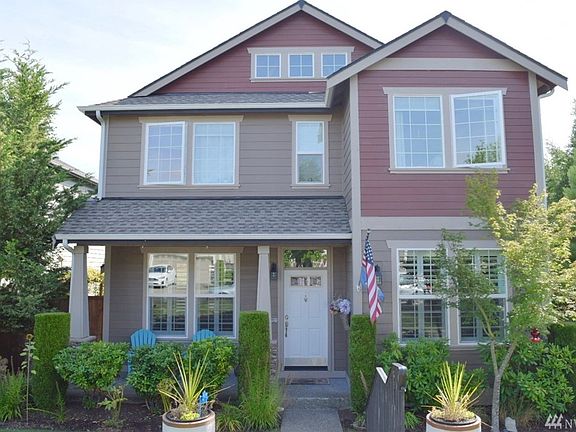 Nice front porch and HOA doesall the front & side yard work & landscaping 