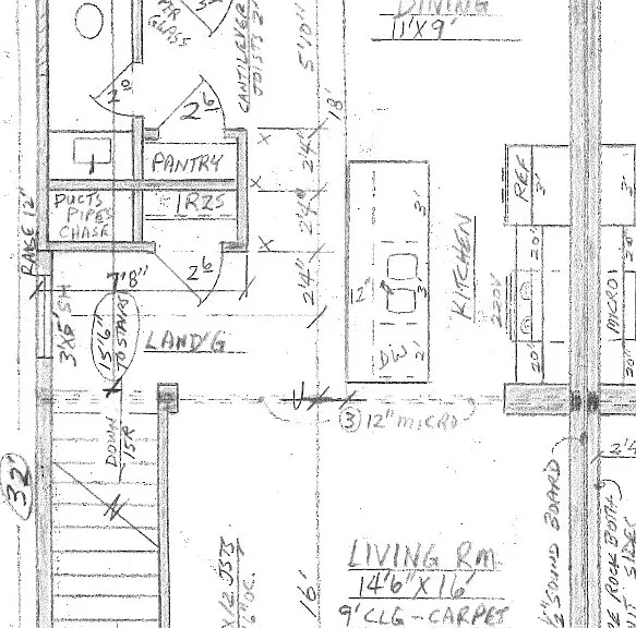 Main 1st floor with living area, kitchen, 1/2 bath, and breakfast area. Note open living area front to back.