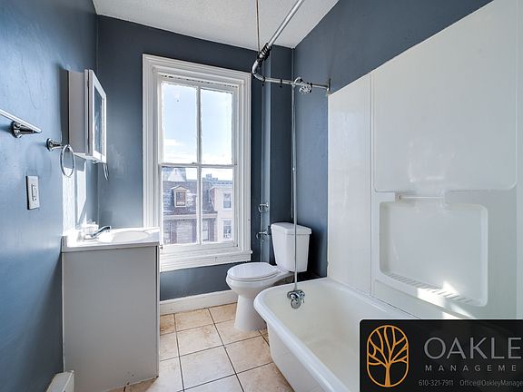 Full bathroom with shower and bath