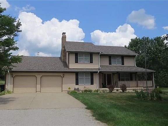 The 2 story farm house just got a new roof, gutters, downspouts and flashing.