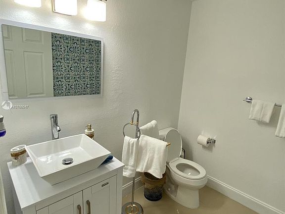 2nd image of 8415 Harding Ave APT 9