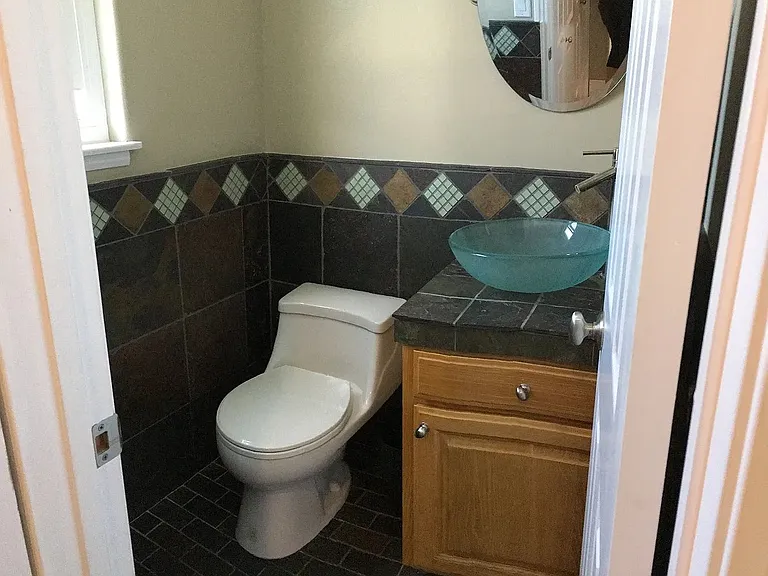 A powder room completes the first level of living.