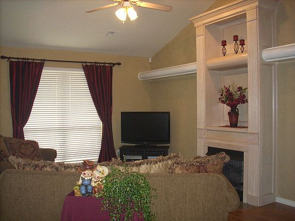 Gas fireplace and large windows make this an inviting room