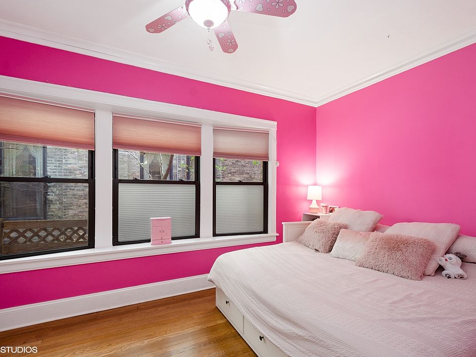 This bedroom has been repainted a neutral color