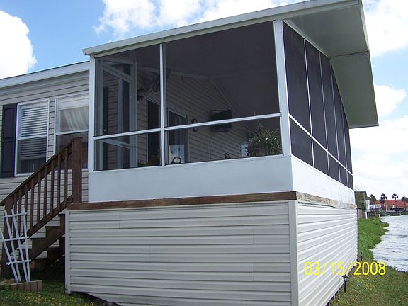 Back of House, screen room entire width of house