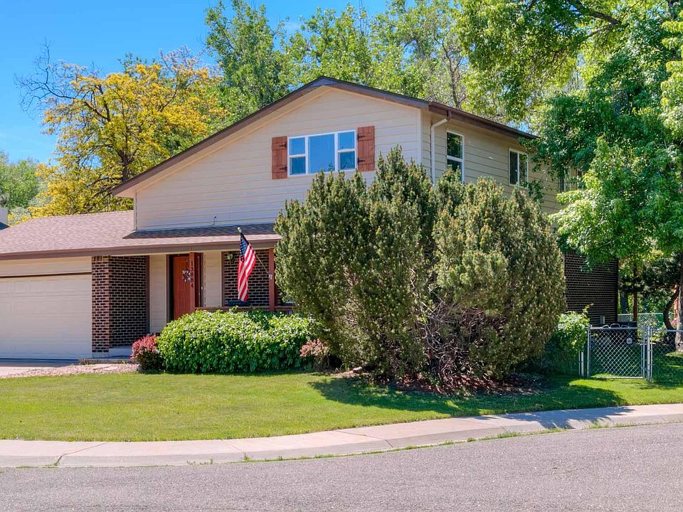 Spacious yard with lots of mature trees borders Ralston Creek Park. Explore home directly on Youtube by searching 13884 W 69th Ave. Arvada, CO 80004. 3D Tour and Walkthrough Video also available.