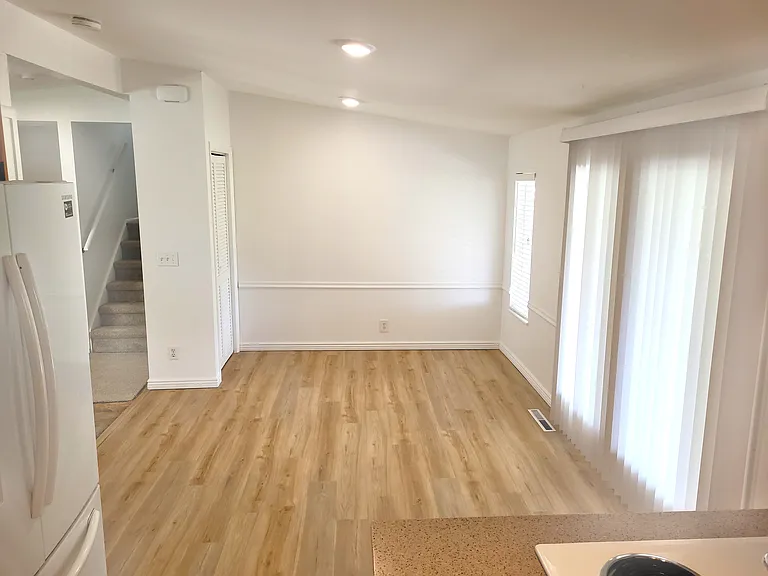 Dining room with LVP flooring and pantry