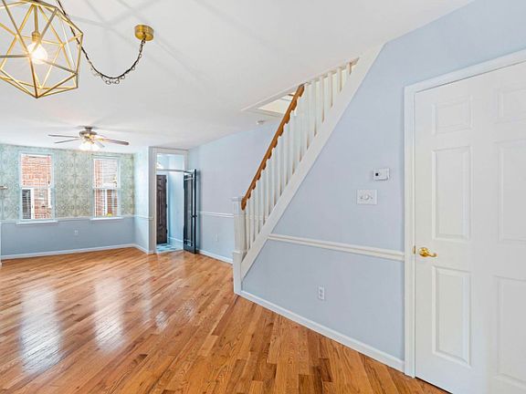Open concept with space for an L Shaped couch, dining room table and room to spare!