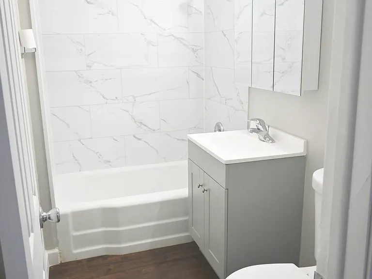 Modern bathroom in a unit at Benson Crest Apartments.