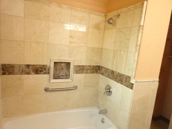 Marble surrounding the tub/shower