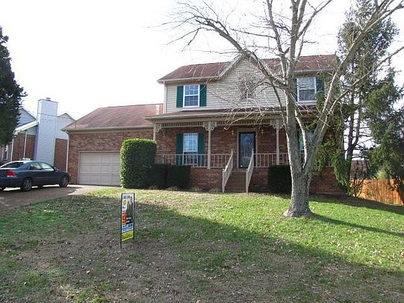 Enjoy lush landscaping, mature trees!