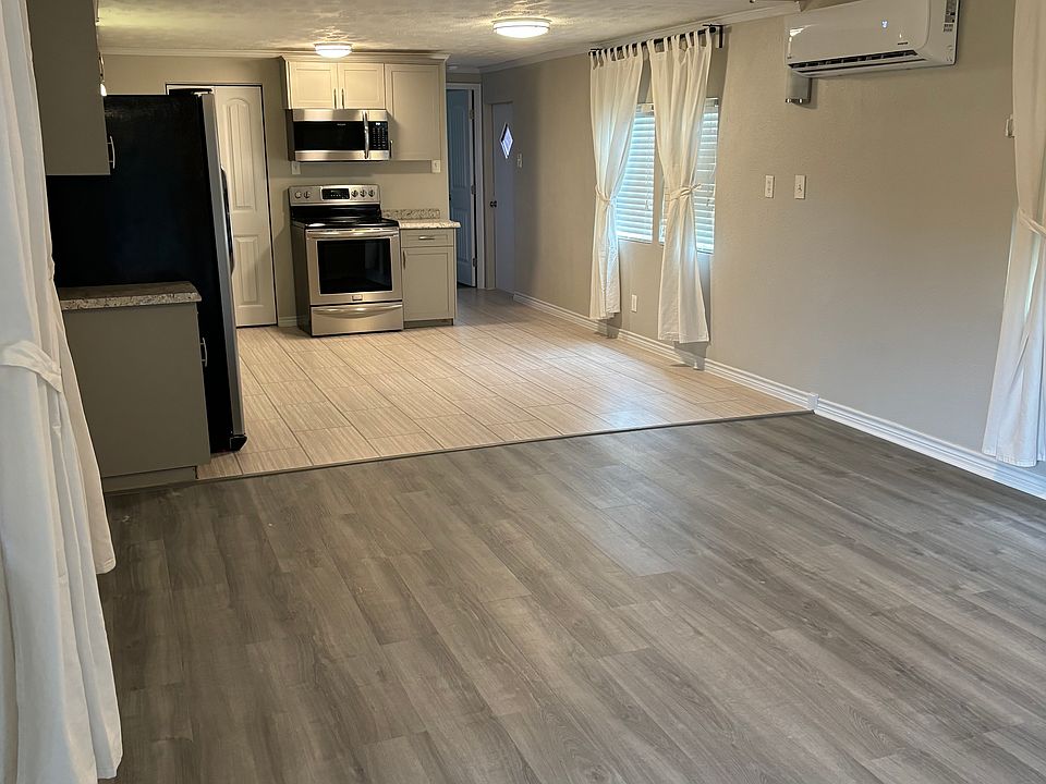 open living room to dining and kitchen