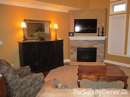 2 Story-Greatroom : Very open, warm greatroom next to kitchen with gas fireplace.