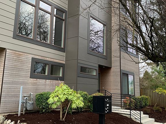 Front of house with mailbox, front steps to house.