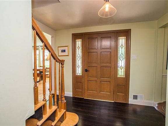 The entire first floor features gorgeous newer or recently refinished flooring.