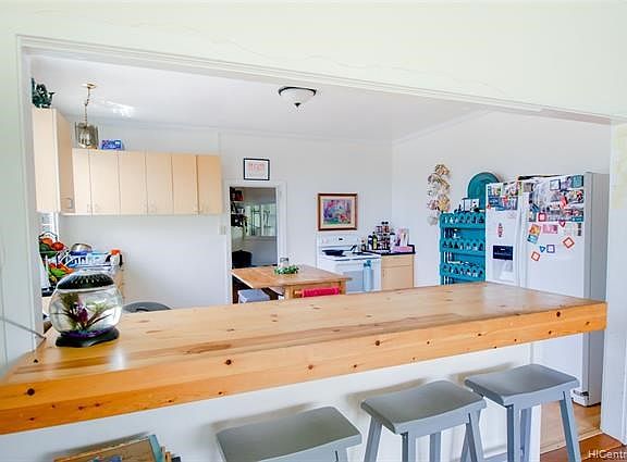 This is the kitchen of the main house when standing in front of the fire place.