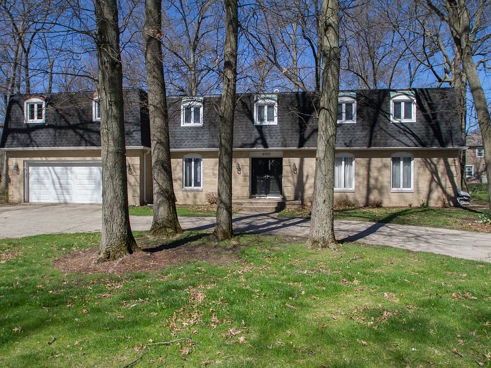 Large circular driveway. Nice neighborhood. Plenty of potential.